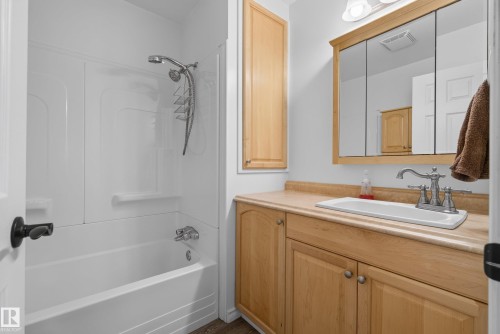 Bathroom featuring a white tub-shower combination with a handheld showerhead - 3 Bristow Crescent, Spruce Grove, AB - Indoor Photo Showing Bathroom