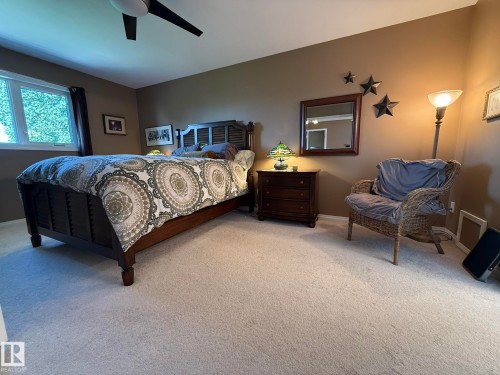 Extra Large Primary Bedroom with Glass Doors and a Large Walk-In Closet + a Full 5pc ENSUITE! - 5604 57 Avenue, Beaumont, AB 