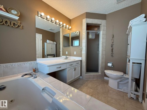 Extra Large Primary 5pc Bathroom with a large Jacuzzi Tub and Separate Shower! - 5604 57 Avenue, Beaumont, AB 