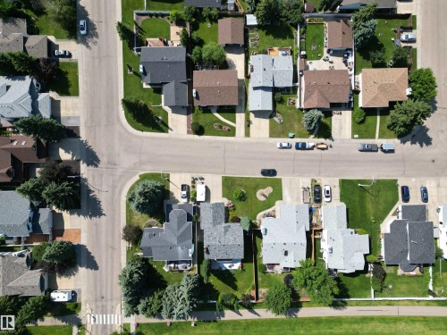 Residential area featuring numerous single-story homes with shingle roofs - 5604 57 Avenue, Beaumont, AB 