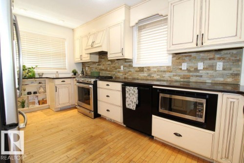 7715 84 Avenue, Edmonton, AB - Indoor Photo Showing Kitchen