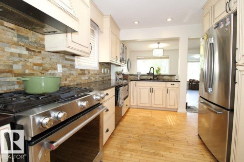 7715 84 Avenue, Edmonton, AB - Indoor Photo Showing Kitchen With Stainless Steel Kitchen With Upgraded Kitchen