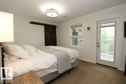 7715 84 Avenue, Edmonton, AB - Indoor Photo Showing Bedroom