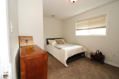 7715 84 Avenue, Edmonton, AB - Indoor Photo Showing Bedroom