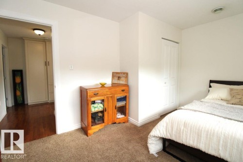 7715 84 Avenue, Edmonton, AB - Indoor Photo Showing Bedroom