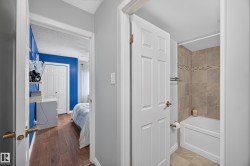 Full bathroom featuring a tiled shower and tub combination - 