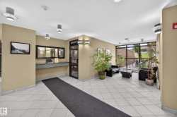 Building lobby featuring light-colored tile flooring - 