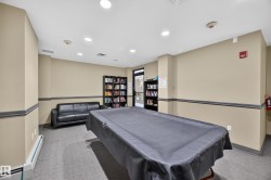 Recreational room featuring a covered pool table, recessed lighting, and carpet flooring - 
