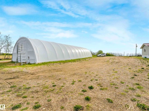 Long hoop house structure on a spacious lot - 57016 Range Road 13, Rural Barrhead County, AB - Outdoor