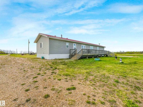 Image quality insufficient for description - 57016 Range Road 13, Rural Barrhead County, AB - Outdoor With Deck Patio Veranda