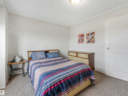 Image quality insufficient for description - 57016 Range Road 13, Rural Barrhead County, AB - Indoor Photo Showing Bedroom