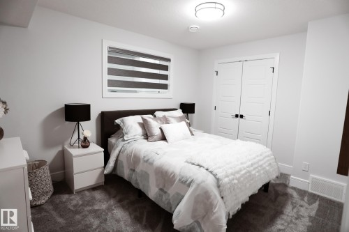 #Bsmt 7449 Chivers Cr Sw, Edmonton, AB - Indoor Photo Showing Bedroom