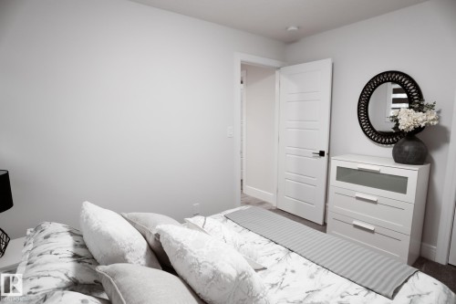 #Bsmt 7449 Chivers Cr Sw, Edmonton, AB - Indoor Photo Showing Bedroom