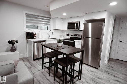 #Bsmt 7449 Chivers Cr Sw, Edmonton, AB - Indoor Photo Showing Kitchen With Stainless Steel Kitchen
