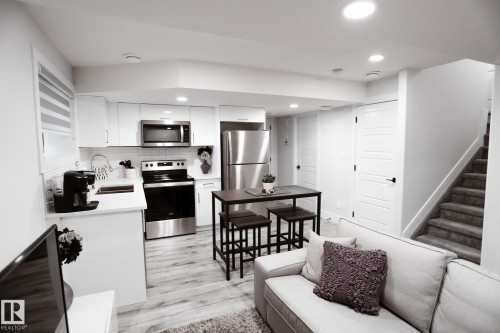 #Bsmt 7449 Chivers Cr Sw, Edmonton, AB - Indoor Photo Showing Kitchen With Stainless Steel Kitchen