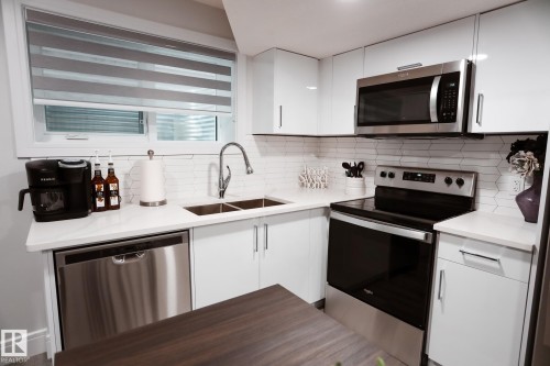 #Bsmt 7449 Chivers Cr Sw, Edmonton, AB - Indoor Photo Showing Kitchen With Stainless Steel Kitchen With Double Sink With Upgraded Kitchen