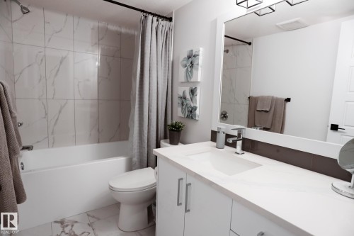 #Bsmt 7449 Chivers Cr Sw, Edmonton, AB - Indoor Photo Showing Bathroom