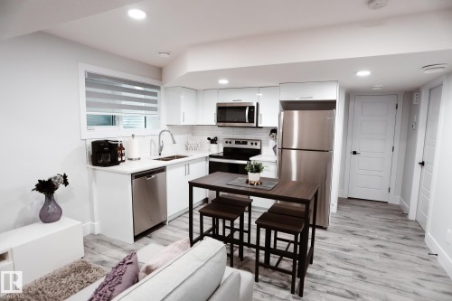 #Bsmt 7449 Chivers Cr Sw, Edmonton, AB - Indoor Photo Showing Kitchen With Stainless Steel Kitchen