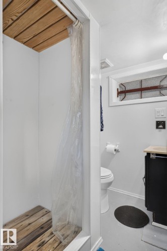 Shower stall featuring wood-finish flooring and ceiling - 12703 122 Street Nw, Edmonton, AB 