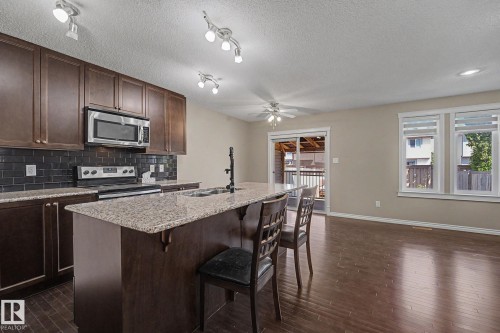 9507 Simpson Crest, Edmonton, AB - Indoor Photo Showing Kitchen With Double Sink With Upgraded Kitchen