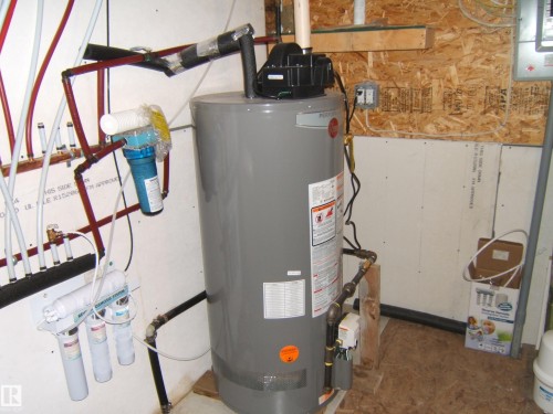 Water heater and water filtration system - 543016 Rng Rd 122, Rural Two Hills County, AB - Indoor Photo Showing Basement