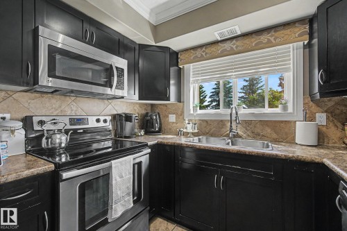 #307 14604 125 St Nw, Edmonton, AB - Indoor Photo Showing Kitchen With Double Sink