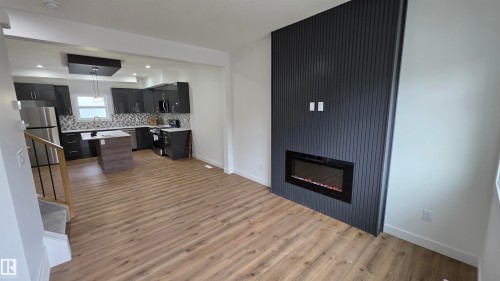 #1 6704 109 St Nw, Edmonton, AB - Indoor With Fireplace