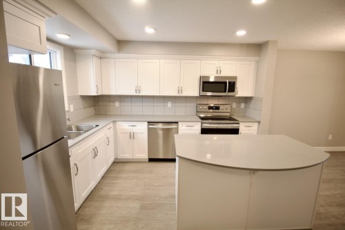 208 Allard Way, Fort Saskatchewan, AB - Indoor Photo Showing Kitchen With Double Sink
