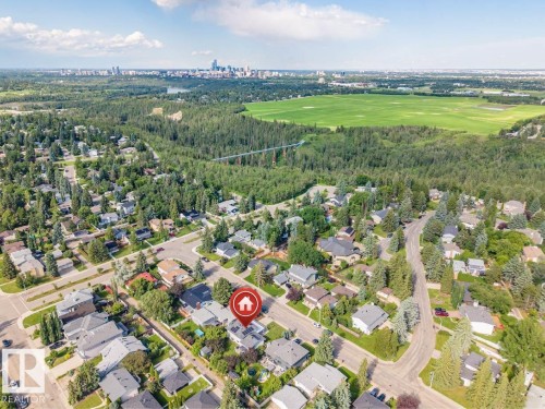 Aerial perspective of a developed residential neighborhood with mature trees - 5212 142 Street Nw, Edmonton, AB - Outdoor With View