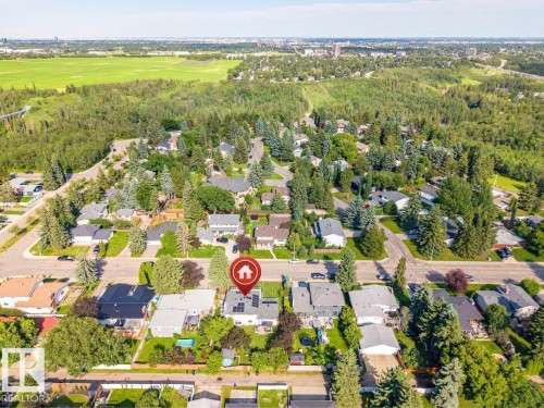 Residential property on a tree-lined street - 5212 142 Street Nw, Edmonton, AB - Outdoor With View
