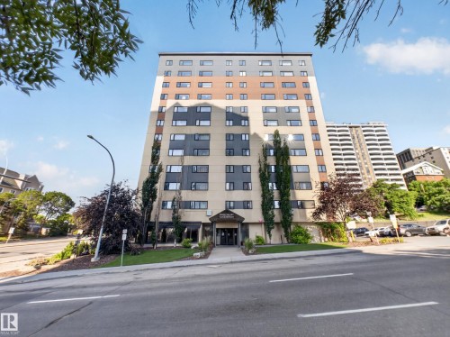 High-rise residential building featuring a multi-story facade with varied window placements - #502 9710 105 St Nw, Edmonton, AB 