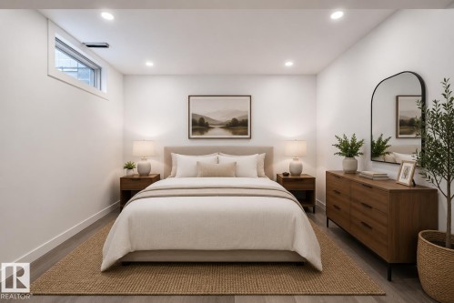 Recessed lighting illuminates this room featuring white walls and a light wood-finish flooring - 27 Apache Crescent, Leduc, AB 