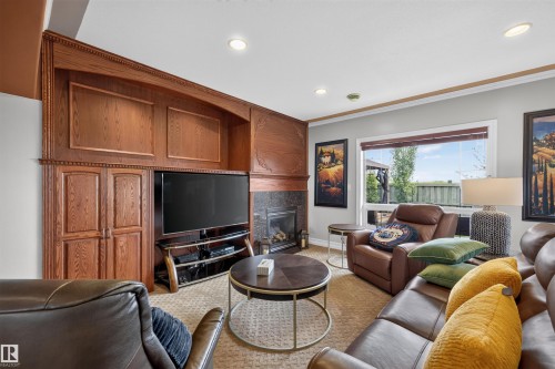 1751 Haswell Cove Nw, Edmonton, AB - Indoor Photo Showing Living Room With Fireplace