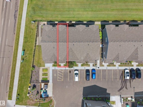 Aerial perspective highlighting a townhome with a composite shingle roof - #30 4137 76 St Nw, Edmonton, AB 