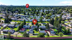 Suburban neighborhood setting with established tree-lined streets and individual residential properties - 
