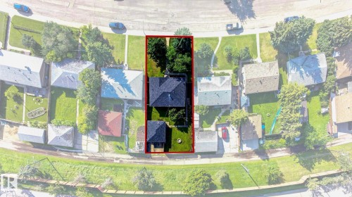Aerial perspective showcasing a rectangular property with a main residence and a smaller detached structure - 16152 110B Avenue Nw, Edmonton, AB - 