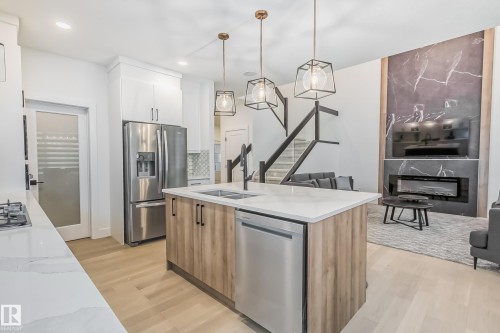 5380 Kimball Place Sw, Edmonton, AB - Indoor Photo Showing Kitchen With Stainless Steel Kitchen With Double Sink With Upgraded Kitchen