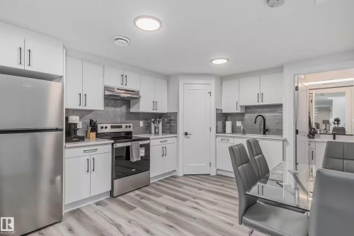 5380 Kimball Place Sw, Edmonton, AB - Indoor Photo Showing Kitchen With Stainless Steel Kitchen