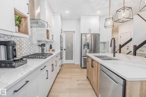 5380 Kimball Place Sw, Edmonton, AB - Indoor Photo Showing Kitchen With Stainless Steel Kitchen With Double Sink With Upgraded Kitchen