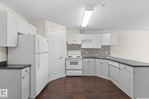 #243 13441 127 St Nw, Edmonton, AB - Indoor Photo Showing Kitchen