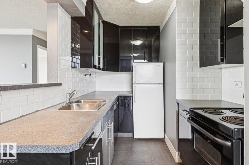 #1107 9930 113 St Nw, Edmonton, AB - Indoor Photo Showing Kitchen With Double Sink