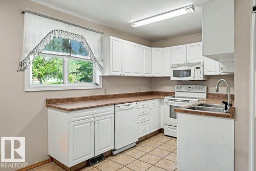 26 Louisbourg Place, St. Albert, AB - Indoor Photo Showing Kitchen With Double Sink