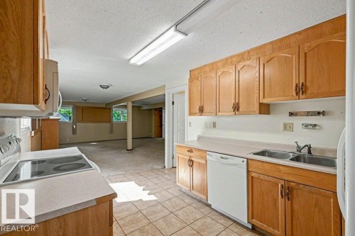 26 Louisbourg Place, St. Albert, AB - Indoor Photo Showing Kitchen With Double Sink