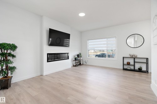 2644 192 Street Nw, Edmonton, AB - Indoor Photo Showing Living Room With Fireplace