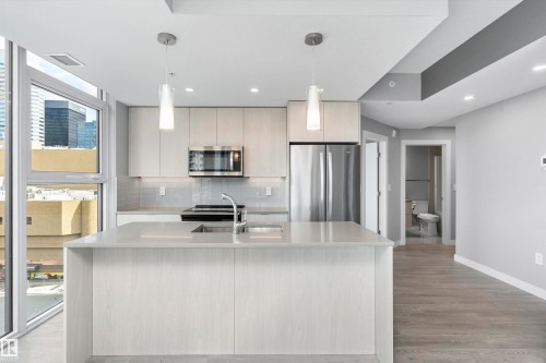 #702 10180 103 St Nw, Edmonton, AB - Indoor Photo Showing Kitchen With Double Sink With Upgraded Kitchen