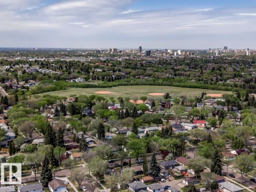 Aerial perspective showcasing a residential area with mature trees - 8511 64 Avenue, Edmonton, AB - Outdoor With View