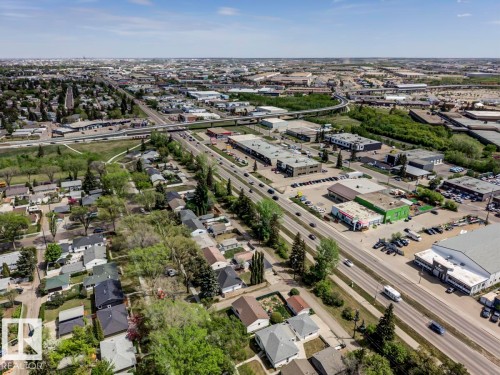 Aerial perspective showcasing a residential area alongside a commercial district - 8511 64 Avenue, Edmonton, AB - Outdoor With View