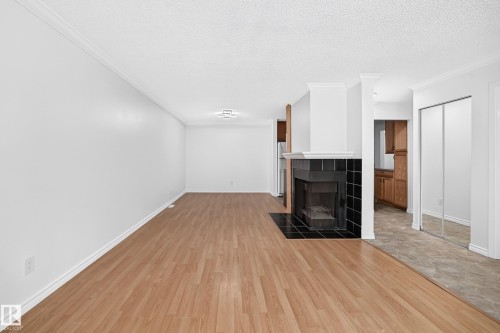 #40 3111 142 Av Nw, Edmonton, AB - Indoor With Fireplace