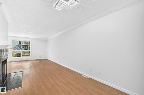 #40 3111 142 Av Nw, Edmonton, AB - Indoor Photo Showing Other Room