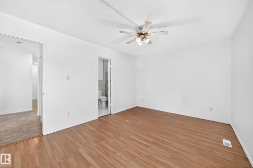 #40 3111 142 Av Nw, Edmonton, AB - Indoor Photo Showing Other Room